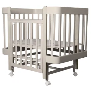 INDIGO Кровать детская Tiny (ложе 100х70, закругленные углы, продольный маятник + колеса) массив б (кашемир-кашемир) INDIGO Кровать детская Tiny (ложе 100х70, закругленные углы, продольный маятник + колеса) массив б (кашемир-кашемир)