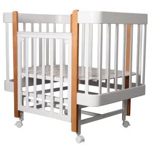 INDIGO Кровать детская Tiny (ложе 100х70, закругленные углы, продольный маятник + колеса) массив б (белый-натуральный) INDIGO Кровать детская Tiny (ложе 100х70, закругленные углы, продольный маятник + колеса) массив б (белый-натуральный)